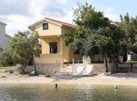 Apartments by the sea Dinjiska, Pag - 9386