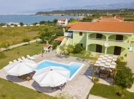 Seaside apartments with a swimming pool Ljubac, Zadar - 11922