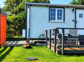 Small Cozy Shepherd hut 20 by 7 feet with boxed in high double bed, campsite in Balmacara