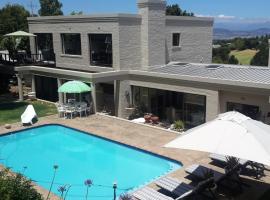 The Greens Guesthouse Bellville Golf Course, hotel con parking en Bellville