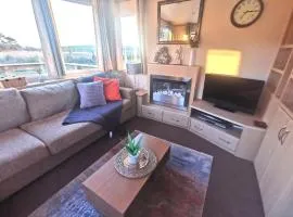 Delightful 3-bedroom static caravan with lazy spa and loch view
