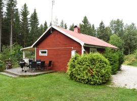 Nice cabin at the foot of Kroppefjall โรงแรมที่มีที่จอดรถในDalskog