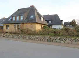 Watthaus-6-Geschmackvolle-Erdgeschosswohnung-mit-Terrasse-und-Strandkorb