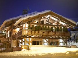 Chalet Whymper avec piscine 150m téléphérique (neuf 2021), Hotel in Megève