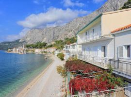 Apartments by the sea Drasnice, Makarska - 2644, отель в Драшнице