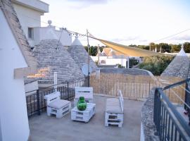 VALLE D'ITRIA Trullo Sovrano sul Monte, hotel en Cisternino