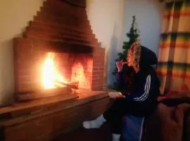 Cabaña con Bañera y Chimeneas en Puesta de Sol