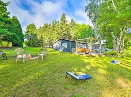 Riverfront Home with Dock about 6 Mi to Cheboygan!