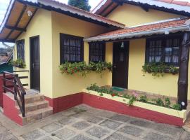 Chalés Juliana Casa 1، فندق في مونتي فيردي