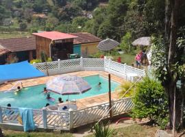 Pousada & Camping Recanto dos Anjos Azuis, viešbutis mieste Pati do Alferesas