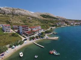 Rooms by the sea Metajna, Pag - 3305, hotell i Zubovići