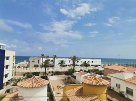 Relaxing flat with open view, next to the beach.
