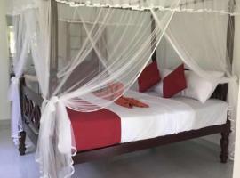 Lush Green Villa, B&B in Talpe