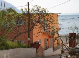 Apartments by the sea Duce, Omis - 5275, hotel in Dugi Rat
