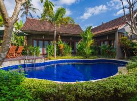 Elemento Homestay Badung, hotel amb piscina a Bringkit