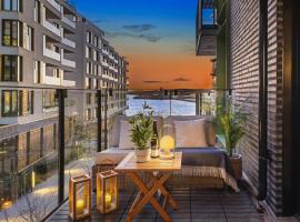 Exclusive apartment, sea view to Oslo fjord, located on water in Oslo center, hotel con campo de golf en Oslo