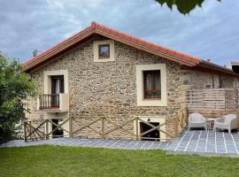 Encuentra el norte en la Casa del buen camino, cabin in Oreña