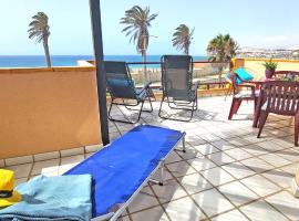 Holiday flat BLUE OCEAN, beachfront, sea view, 1 bedroom, livingroom, fast internet, hotel en Costa Calma