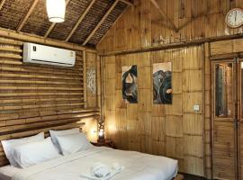 สวนเกษตรรักษ์ไผ่ Bamboo Conservation Farm – tani hotel w mieście Surin