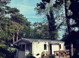 Knus chalet midden in de bossen, rental pantai di Nunspeet