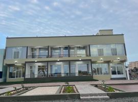 استراحة نادي اورجان Orjan Guest House, hotel na pláži v destinácii Camp