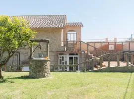 Casa con jardín y gran terraza con vistas al mar