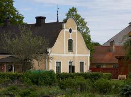 Lövstabruks Värdshus, hotel v destinaci Lövstabruk