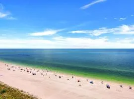 Charming beachfront condo with pool, spa and views