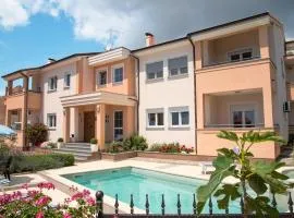 Family friendly apartments with a swimming pool Vinkuran, Pula - 15736