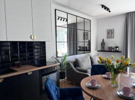 Nr 1 EUROPA22 Premier Apartament z balkonem JEST WINDA "Strzeżone Osiedle BROWARNA" CENTRUM MIASTA Opcjonalnie z garażem Quick Check-in, casă de vacanță din Tomaszów Mazowiecki