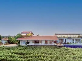 SaffronStays Onellaa, Nashik - infinity pool villa surrounded by a vineyard