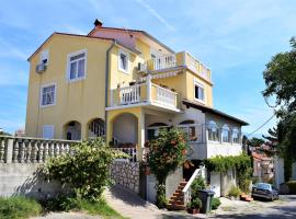 Apartments and rooms with parking space Lopar, Rab - 19238, habitación en casa particular en Lopar