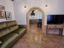 Casa Flora - Casa rural con encanto، بيت عطلات في El Carpio de Tajo