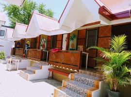 Sandstorm Lodge and Cafe: Puerto Galera şehrinde bir kiralık sahil evi
