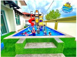 Private Water Park at Cozy House HS Sweet Homestay, holiday home in Cukai