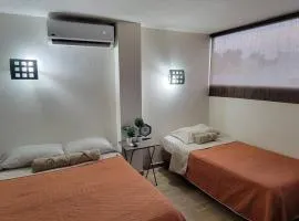 Bonito Departamento con 2 camas con clima, parking, wifi 110mb, ,cocineta, 8