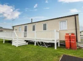 Lovely Caravan With Decking At Seawick Holiday Park In Essex Ref 27471sw