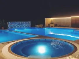 Laguna House next to Pool at Bazaleti Lake
