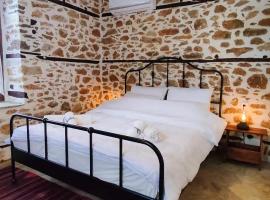 San Lorenzo Cottage - Παραδοσιακά Πέτρινα Δωμάτια, cheap hotel in Agios Lavrentios