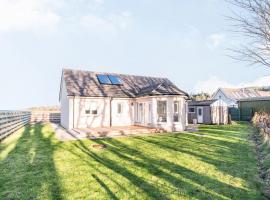 West Burnside Beach Cottage, holiday home in Tayinloan