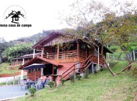 Nossacasa-de-campo, מלון בבלומנאו