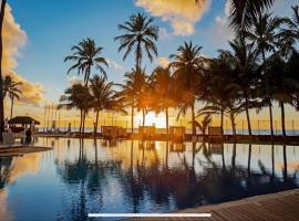 Flat no Hotel Jati&uacute;ca su&iacute;tes resort