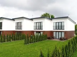 Geräumiges Ferienhaus in Damp in Strandnähe
