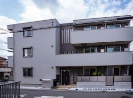 震雲マンション105، شقة في أوساكا