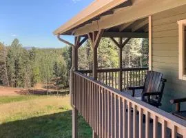 Hilltop Haven with Wraparound Deck and Mountain Views!