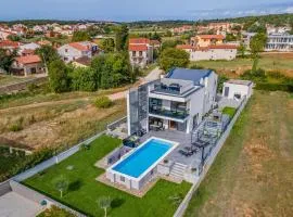 Amazing Home In Pomer With Outdoor Swimming Pool