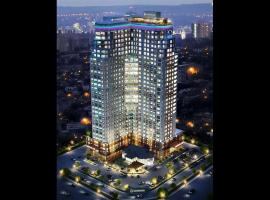 Family Suites at Mansion One by MAJ, alquiler vacacional en la playa en George Town