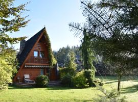 DOMKI JANOSIK - Janosik Góralski z kominkiem, hotel with parking in Łopuszna