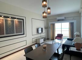 Seaview Suite at Rainbow Paradise, Ferienwohnung mit Hotelservice in Tanjung Bungah