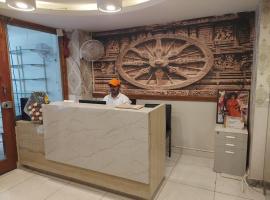 Aum Hotel, πανδοχείο σε Puttaparthi